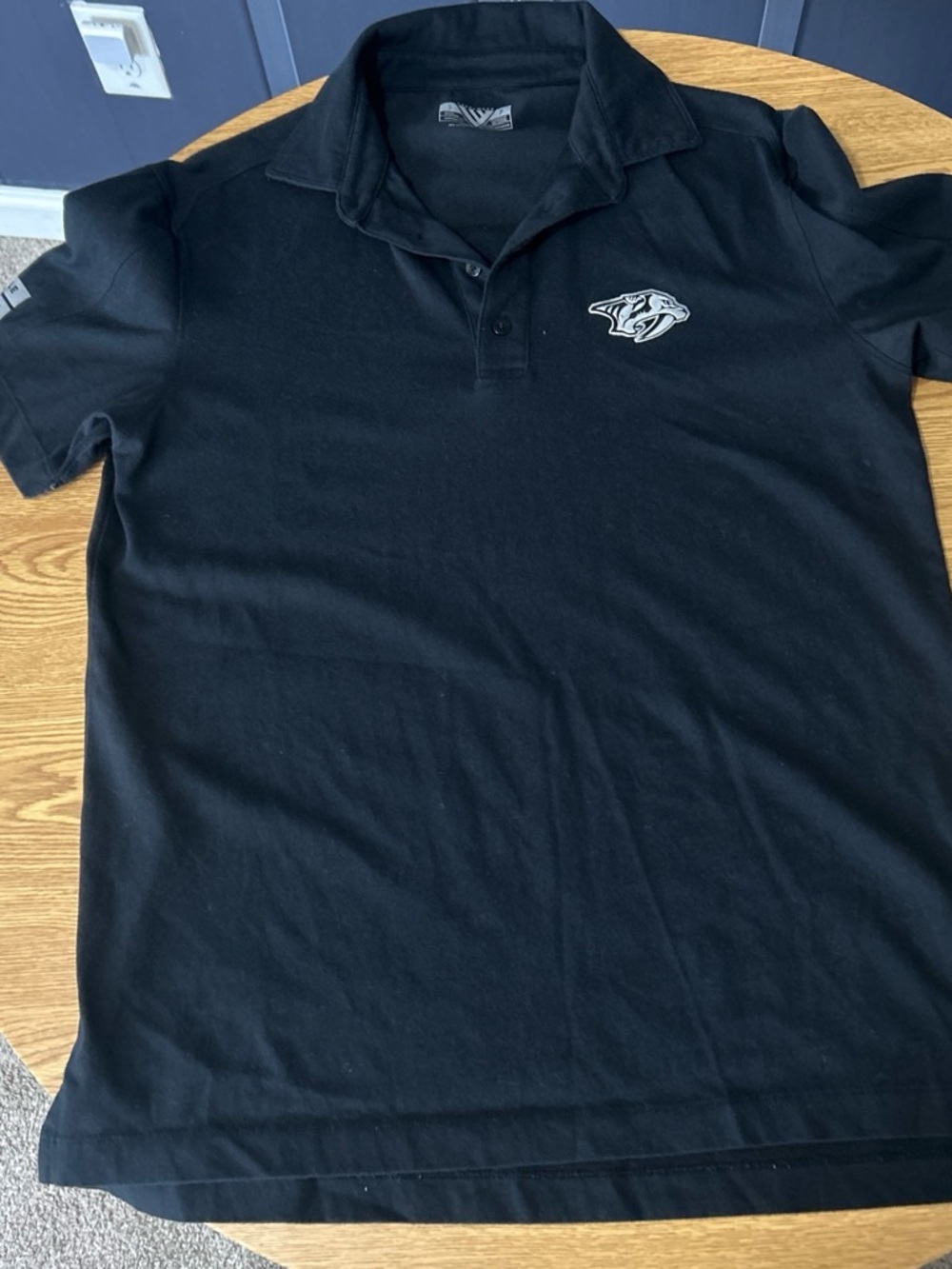 NHL Official Men’s Black Polo with Embroidered Logo